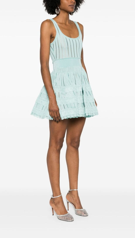 ARCHETYPES RIBBED POINTELLE-KNIT MINI DRESS IN GREEN