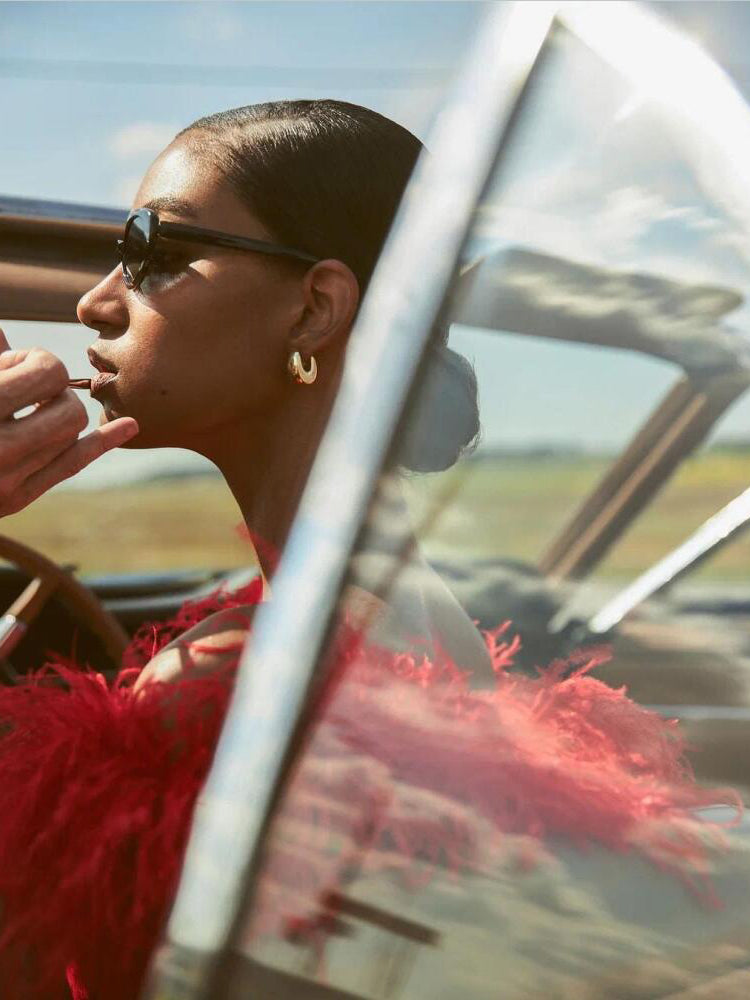 Off-shoulder feather panel red dress