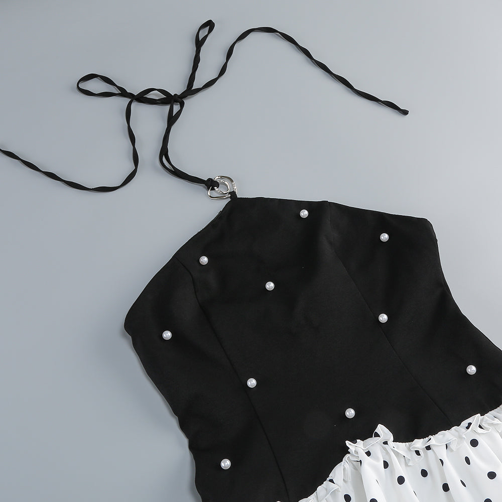 Schwarz-weißes Minikleid mit Perlen 