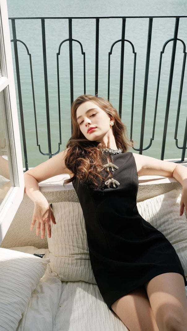 AIIZIE CECILIA HOLLOW BOW MINI DRESS IN BLACK - product image