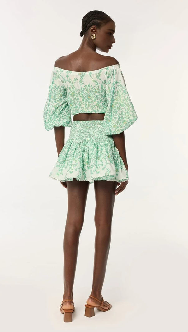 AIIZIE OFF-SHOULDER FLORAL PRINT MINI SKIRT SET IN GREEN - product image