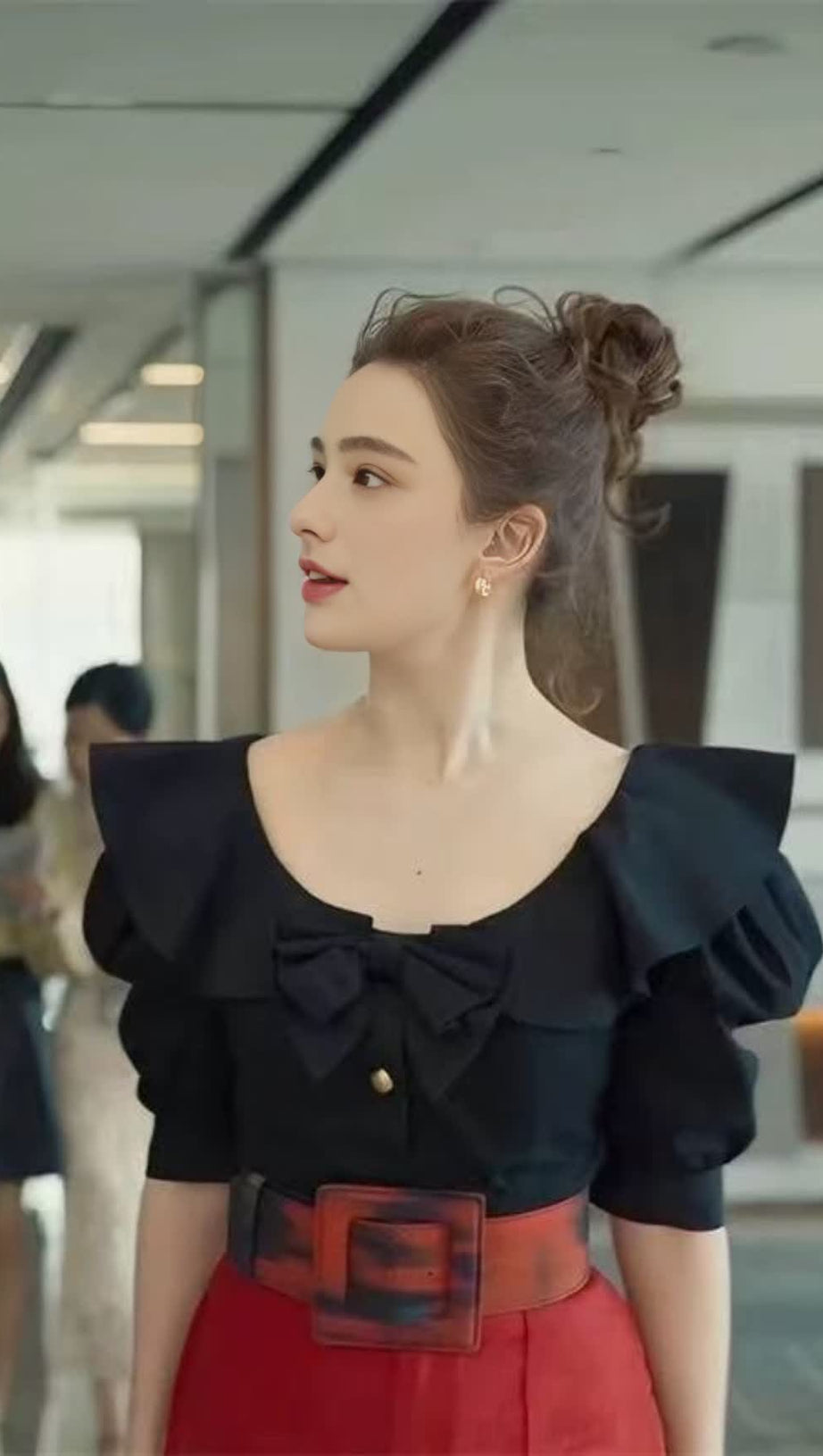 BLACK  TOP WITH RUFFLED LARGE ROUND NECK