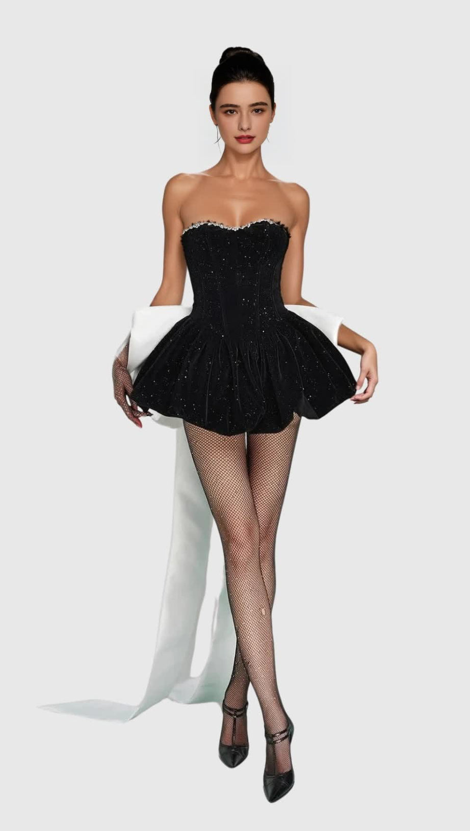 ZAAHIR RHINESTONE BOW SEQUIN STRAPLESS MINI DRESS