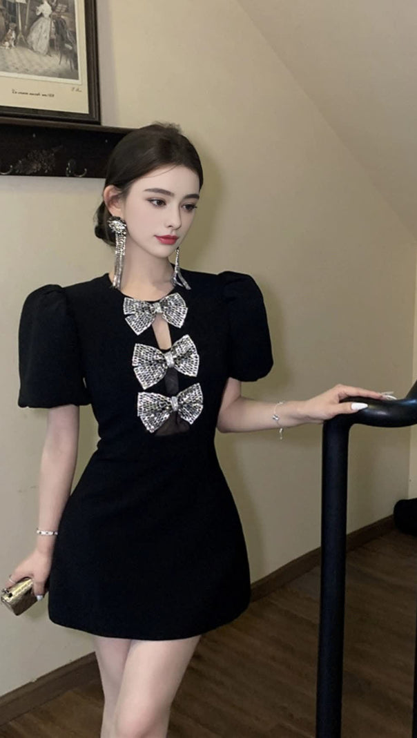 AIIZIE VANESSA BOW PUFF SLEEVE MINI DRESS IN BLACK - product image