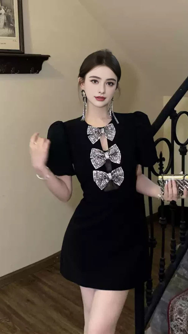 AIIZIE VANESSA BOW PUFF SLEEVE MINI DRESS IN BLACK - product image