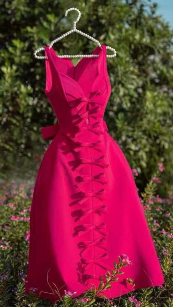ABITO MIDI CON SPALLINE E FIOCCO ROSA