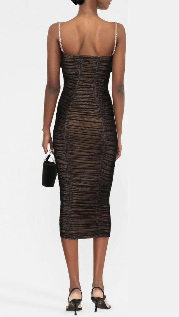MIDIKLEID MIT SCHLEIFE UND NETZTRÄGERN IN SCHWARZ
