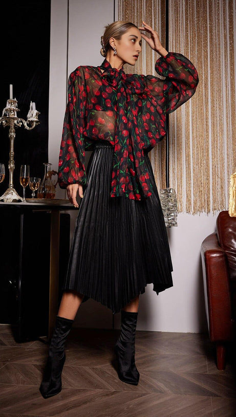 LEATHER PLEATED SKIRT IN BLACK