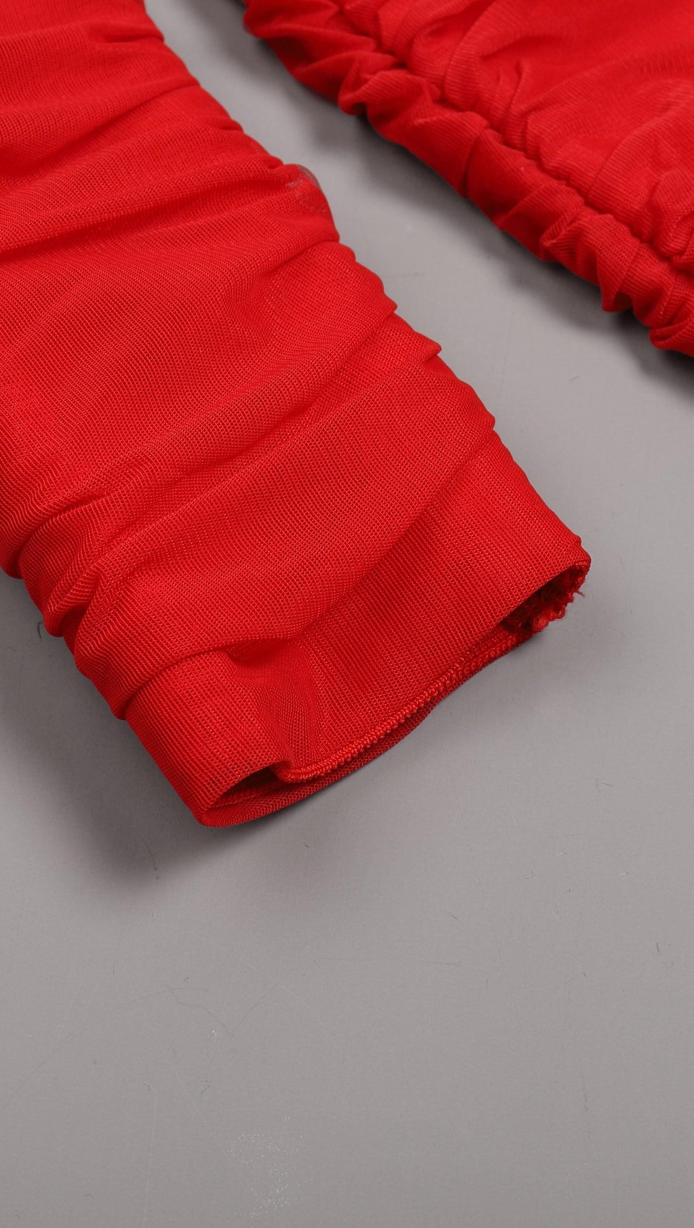 ONE SHOULDER RUCHED MINI DRESS IN RED