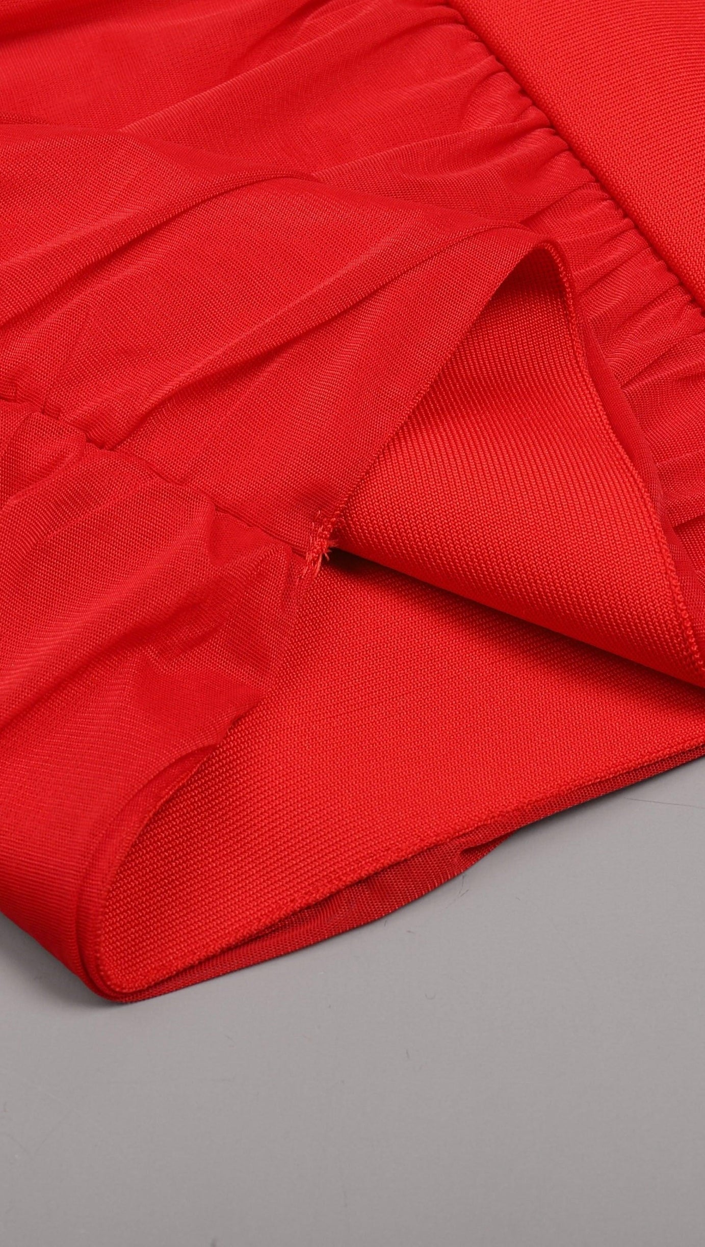 ONE SHOULDER RUCHED MINI DRESS IN RED