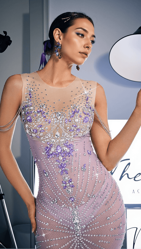 ABITO LUNGO CON PIUME E STRASS CHAVIV