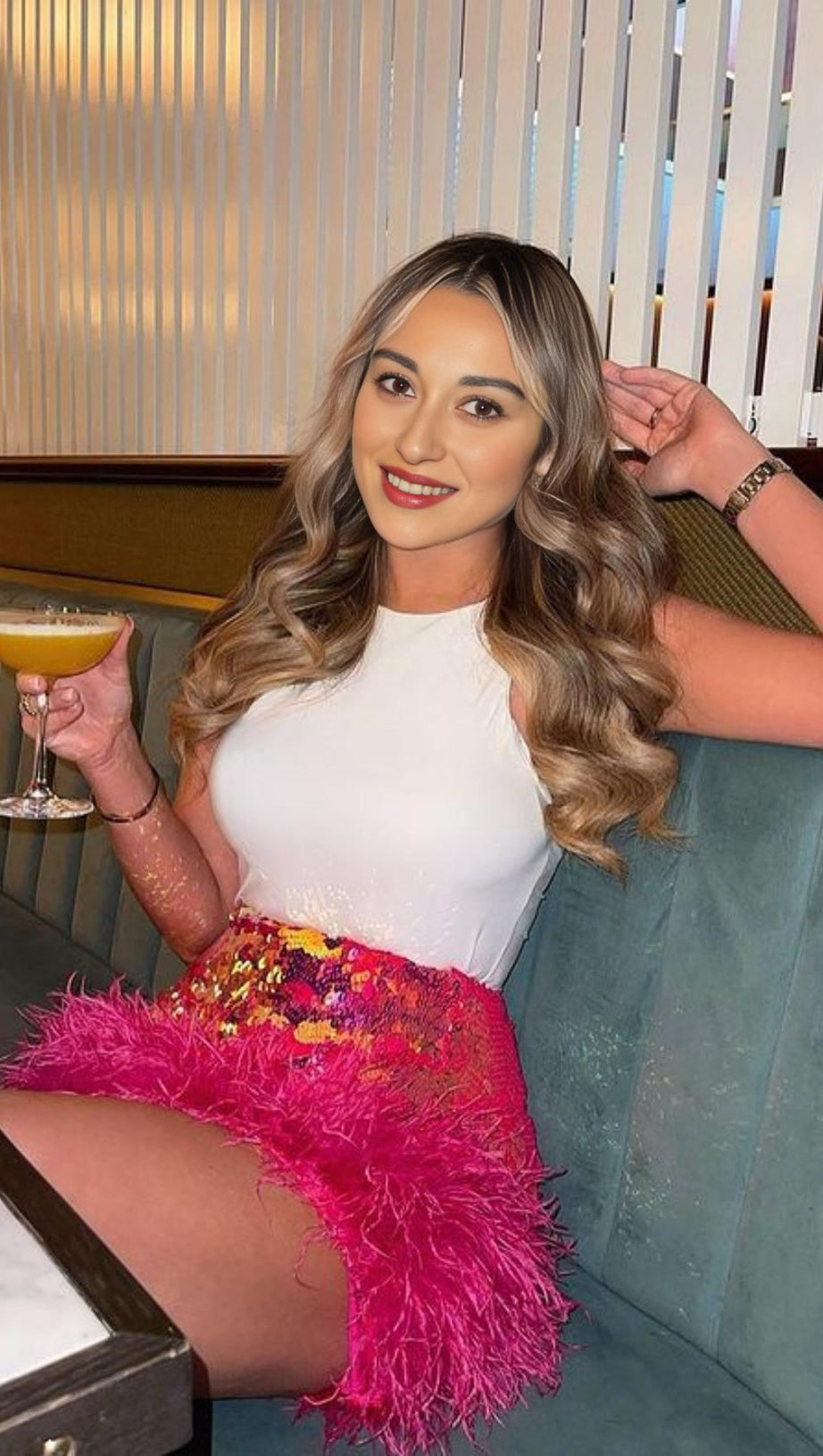 MINIGONNA CON PIUME E PAILLETTES