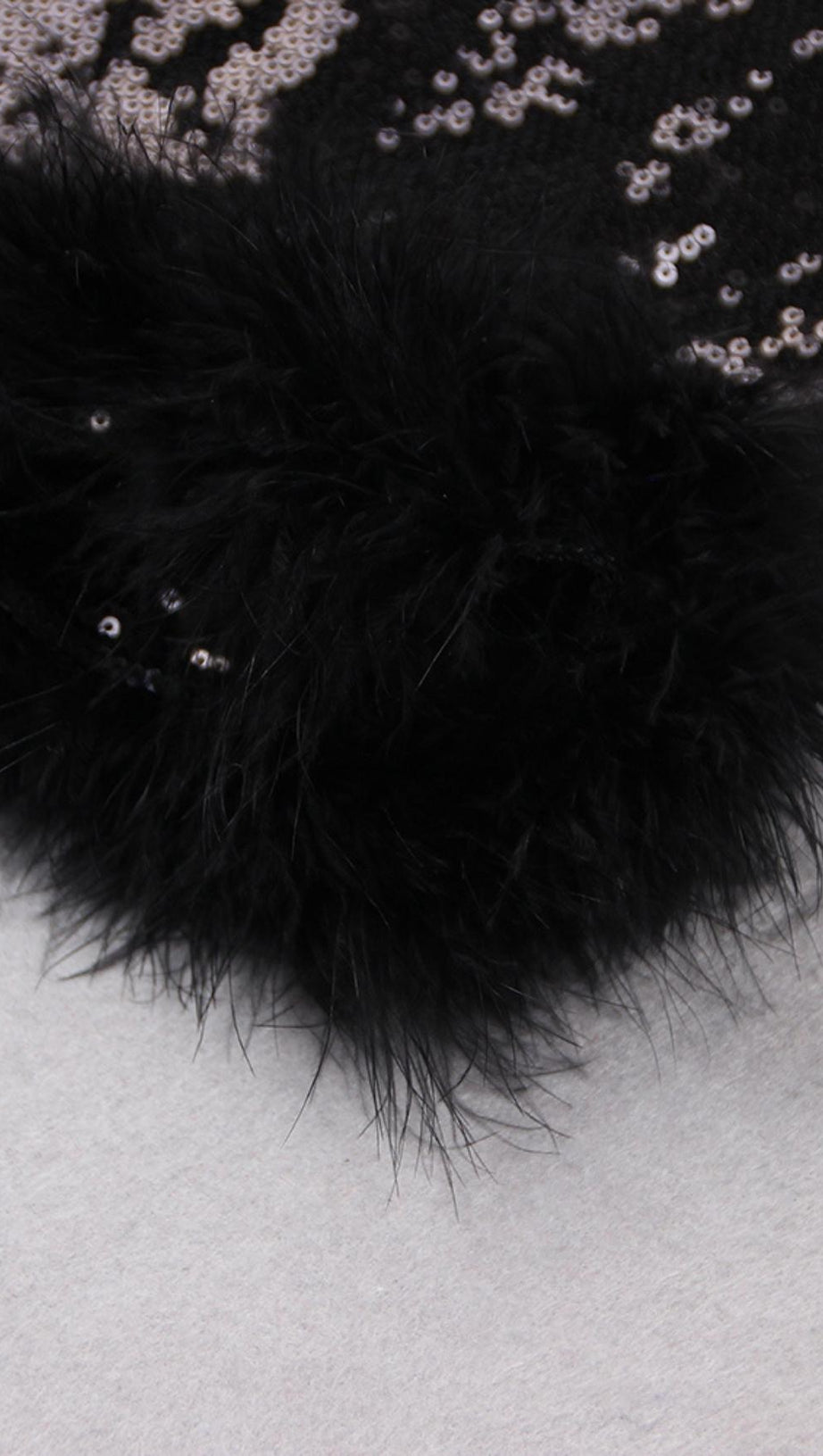 MINIGONNA CON PIUME E PAILLETTES