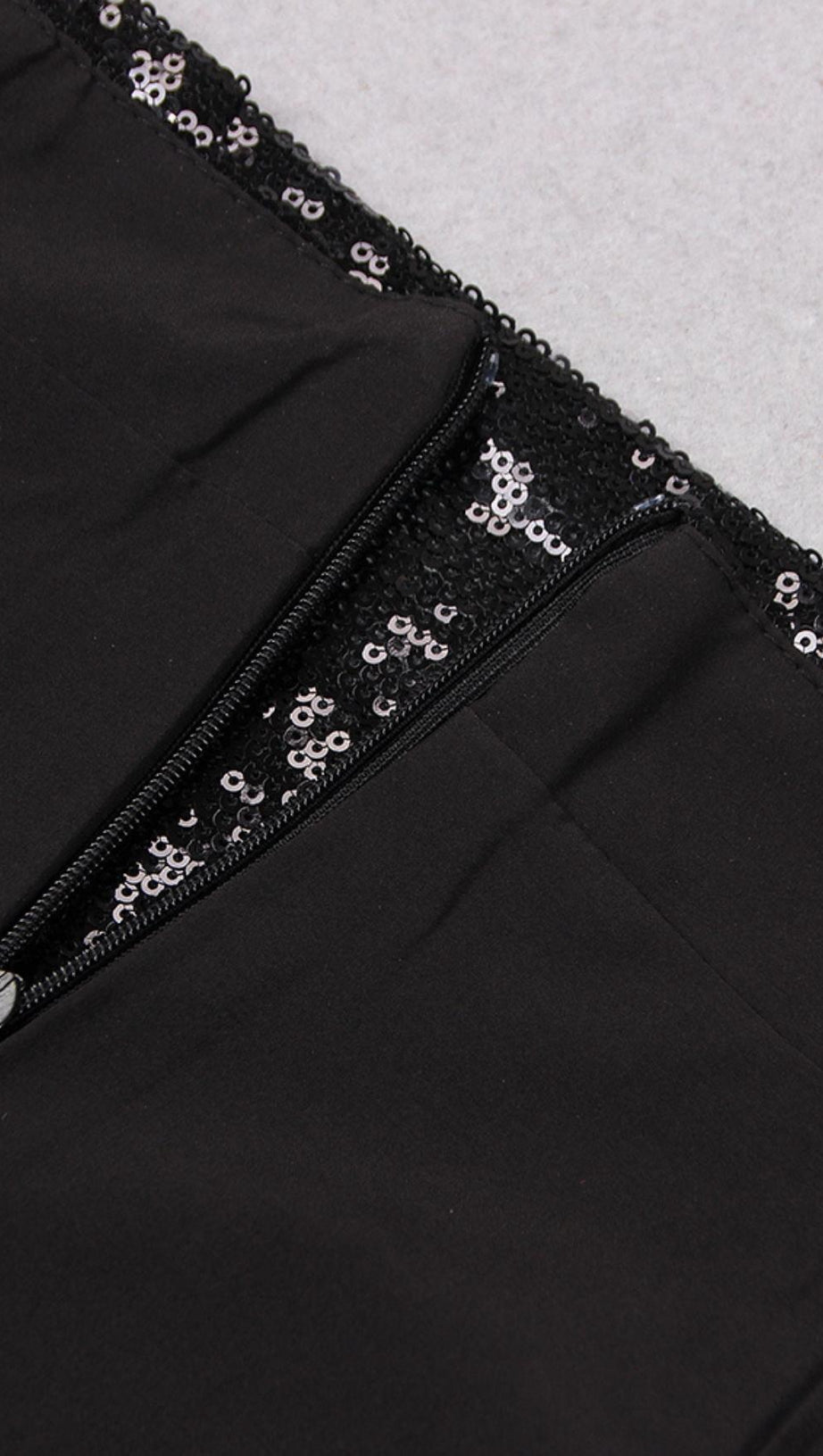 MINIGONNA CON PIUME E PAILLETTES