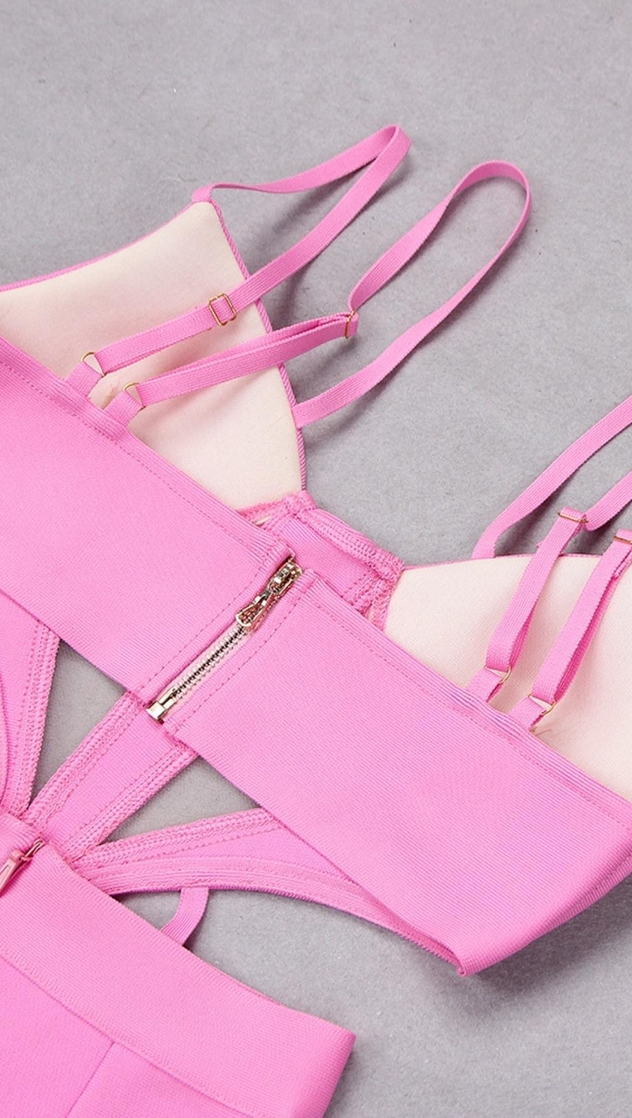 BANDAGE CUT-OUT JUMPSUIT IN ROSA