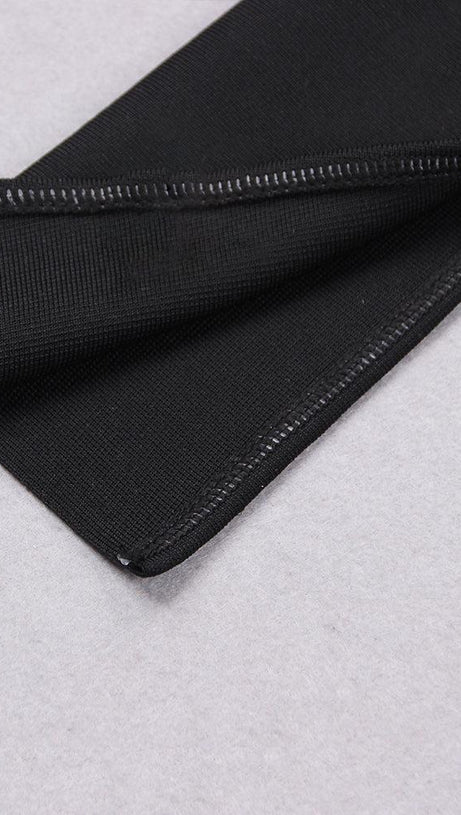 ABITO MIDI CON SPALLE SCOPERTE E PIUME