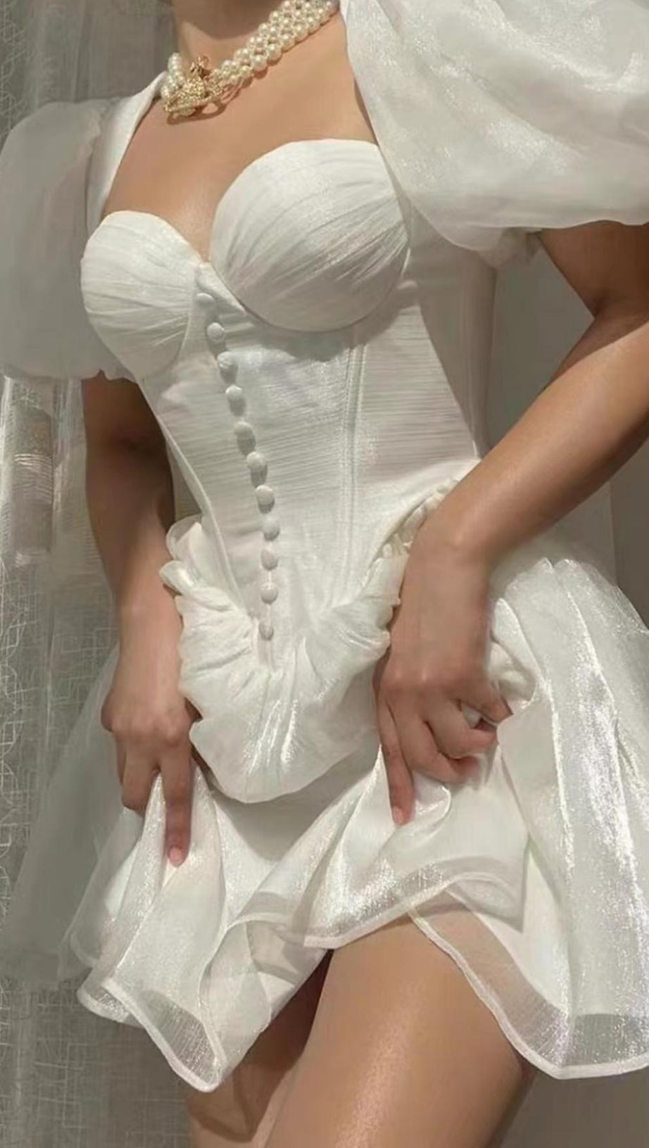 MINI ABITO CON CORSETTO E MANICHE A SBUFFO