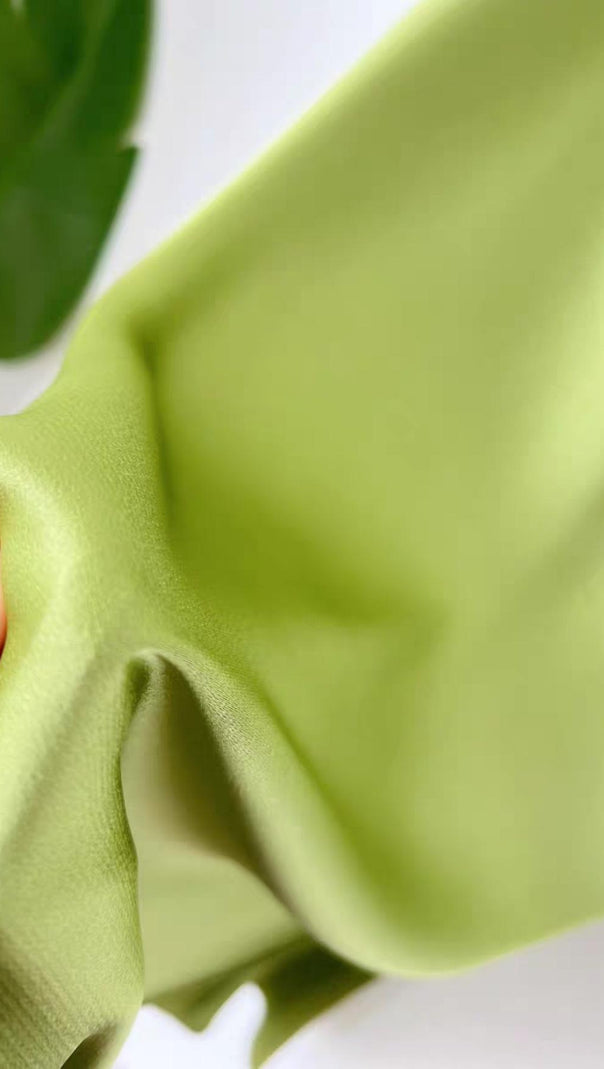 AIIZIE BANDAGE STRAP MIDI DRESS IN AVOCADO - product image
