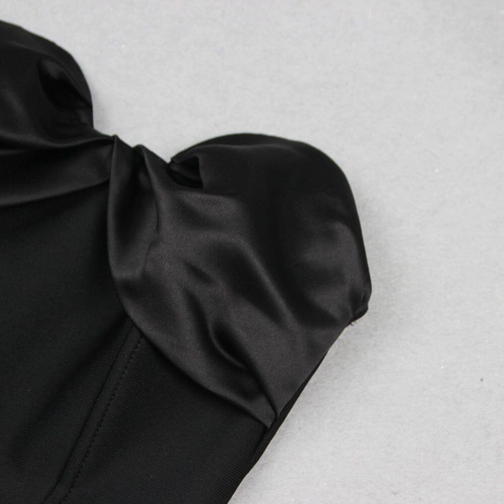 AIIZIE BLACK STRAPLESS JUMPSUIT WITH TIERED RUFFLE HEM - product image