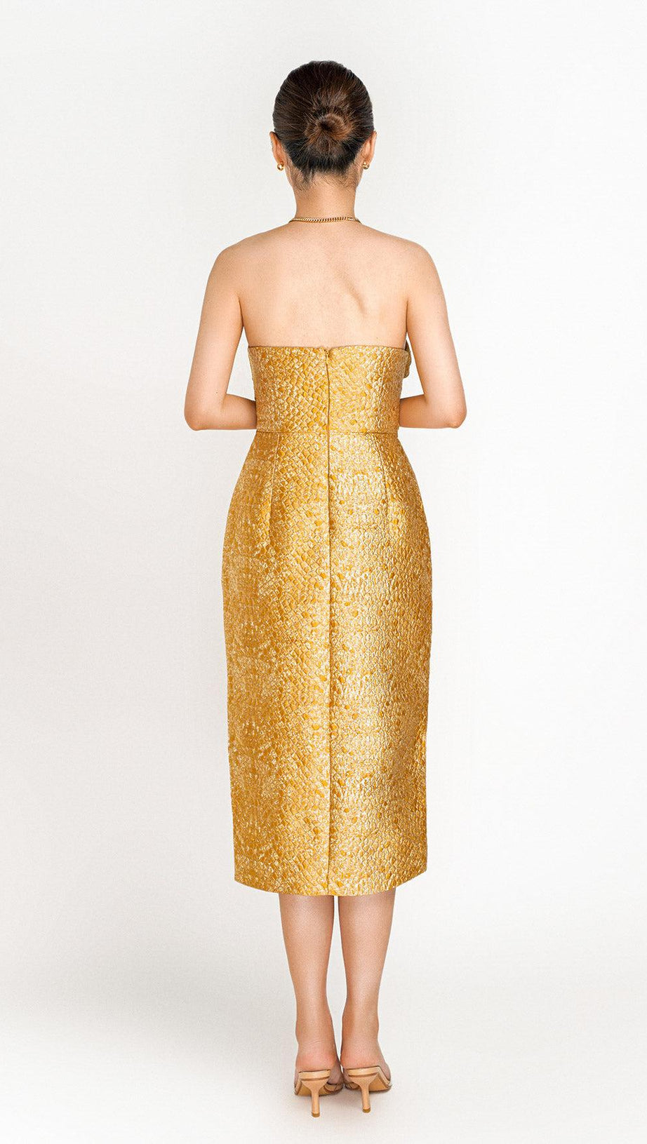 STRAPLESS SPLIT MIDI DRESS IN GOLD