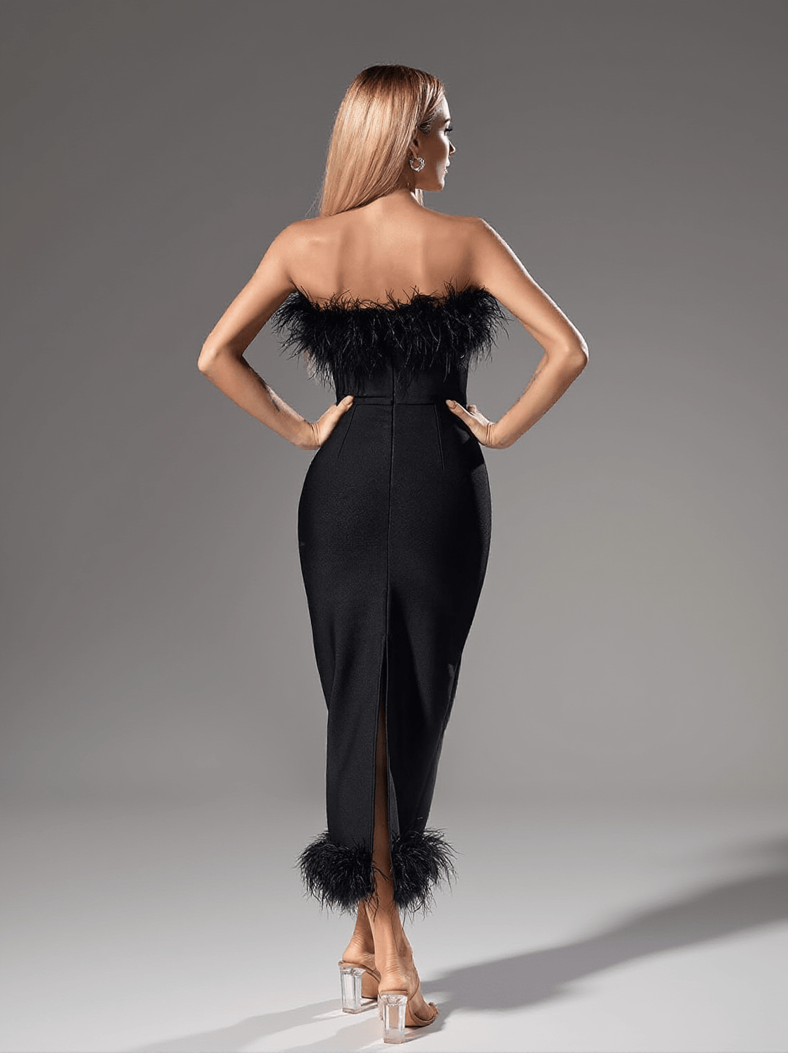 SALOME STRAPLESS FEATHER TRIMMED BANDAGE DRESS IN BLACK
