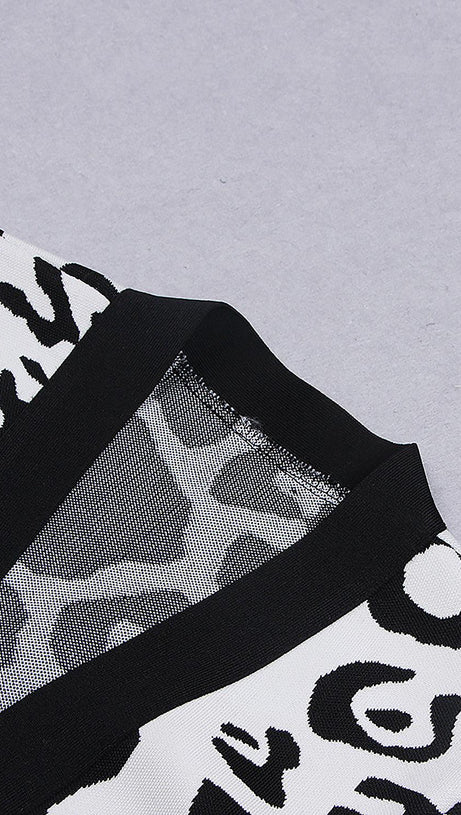 Kurze Bandagejacke mit tiefem V-Ausschnitt und Leopardenmuster in Schwarz