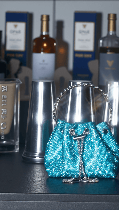 MATTEA CRYSTAL EMBELLISHED BUCKET BAG IN BLUE