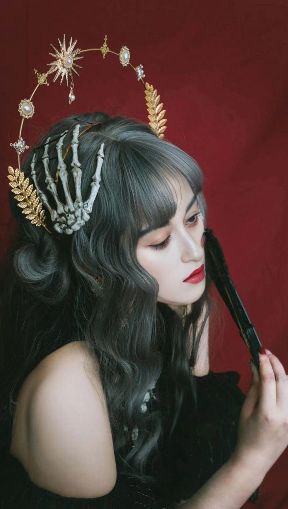 FERMACAPELLI A FORMA DI TESCHIO E OSSO