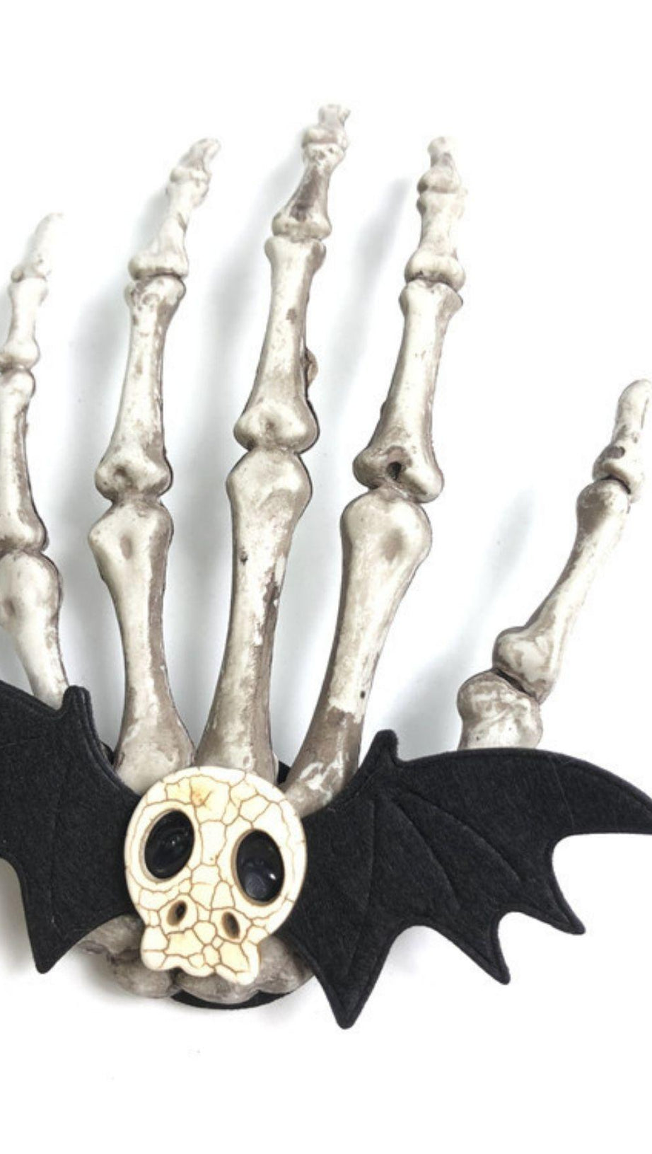 FERMACAPELLI A FORMA DI TESCHIO E OSSO