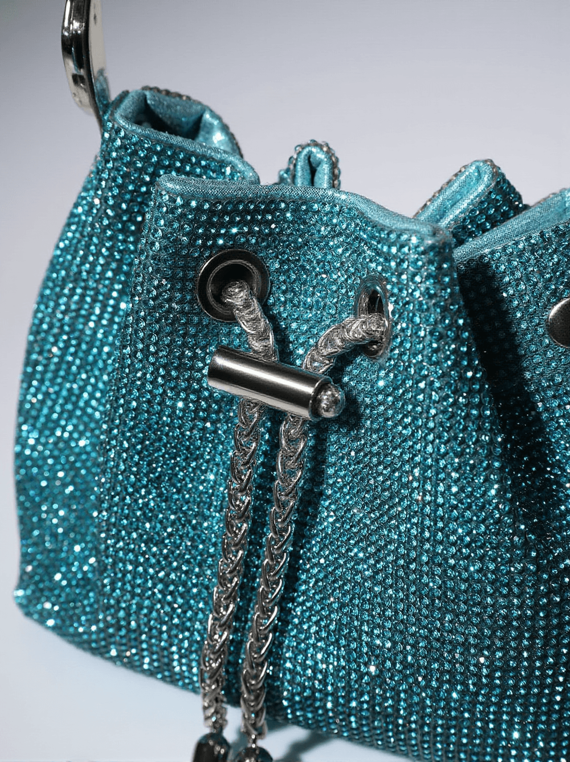 Mattea Crystal Embellished Bucket Bag In Blue