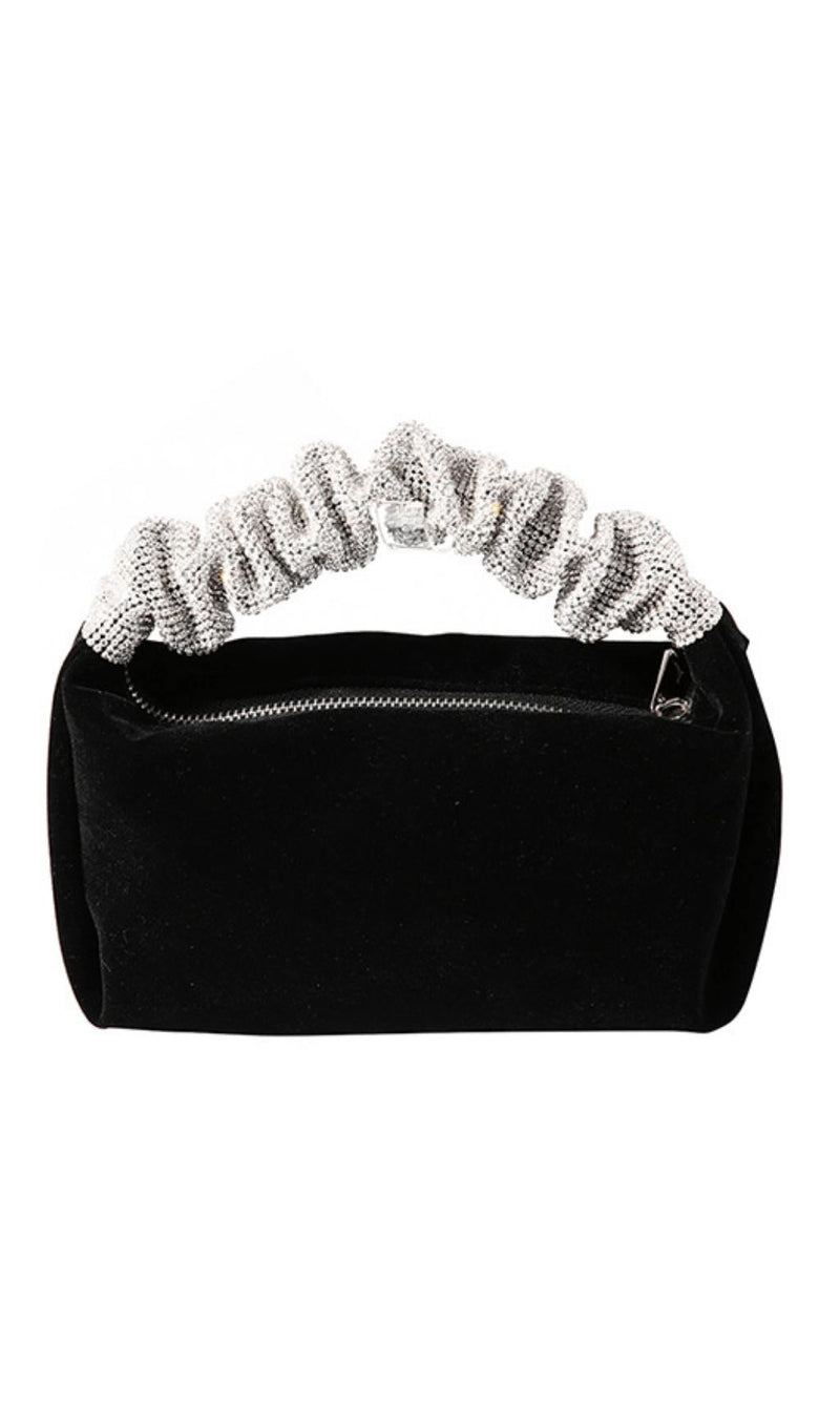 Diamond-studded velvet evening bag.