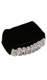 Diamond-studded velvet evening bag.