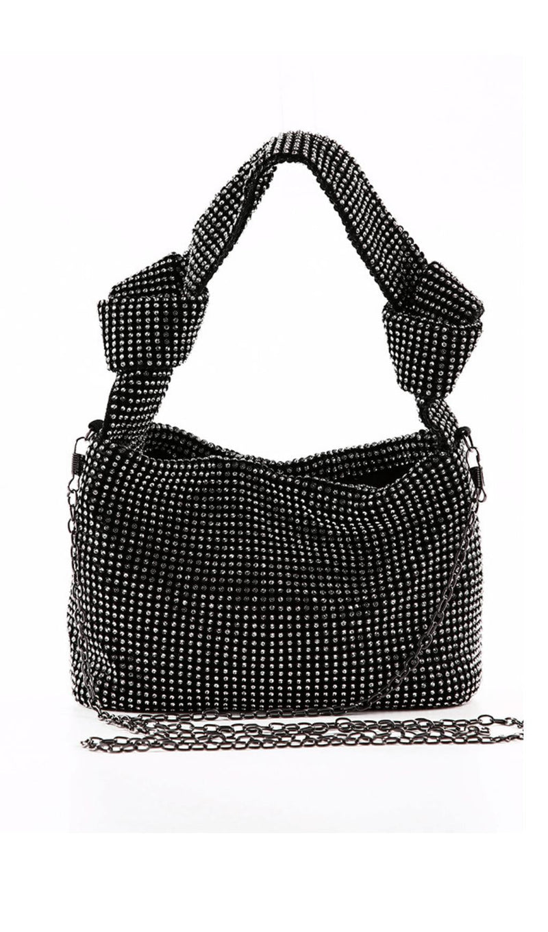 Diamond-studded dinner bag.