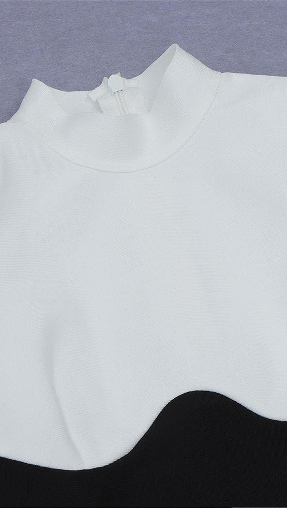 SCHWARZ-WEISSES BANDAGEKLEID MIT NÄHTEN 