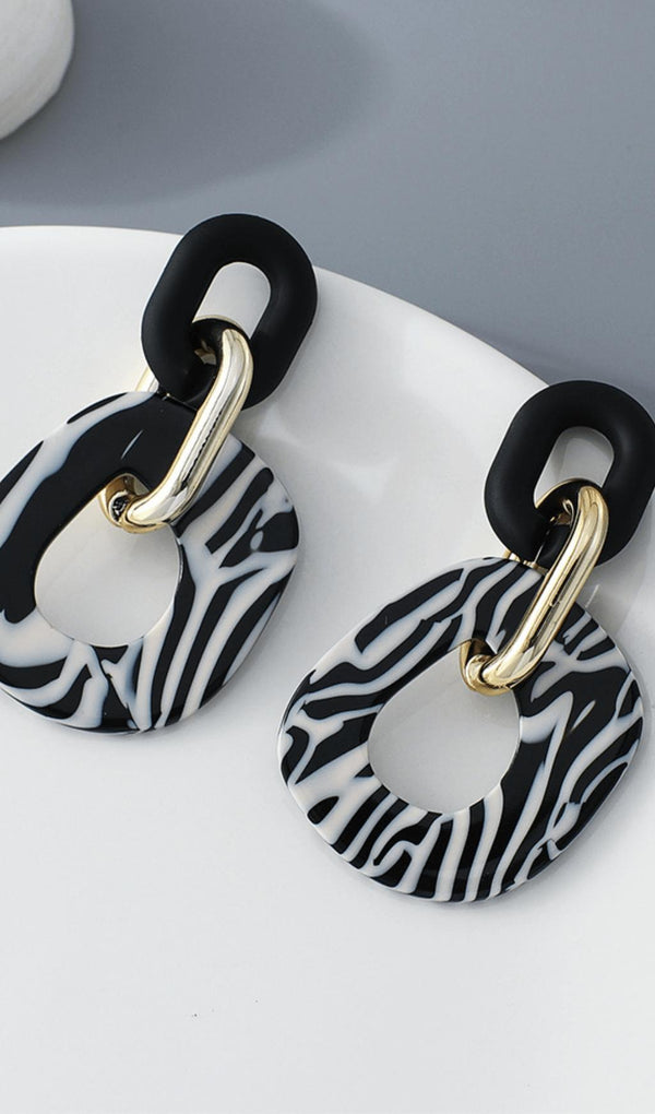 Zebra print earrings.