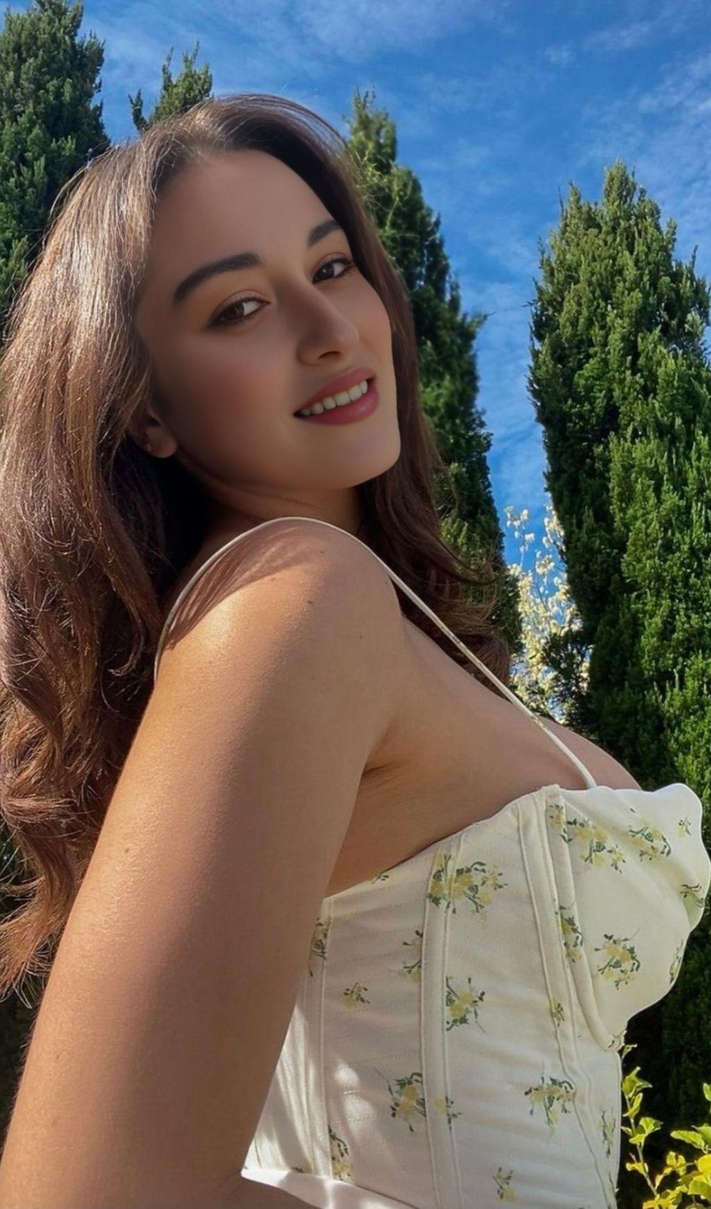 MUCCHIO DI FIORI SPEZZATI MUCCHIO CANOTTIERA CON COLLO A MUCCHIO