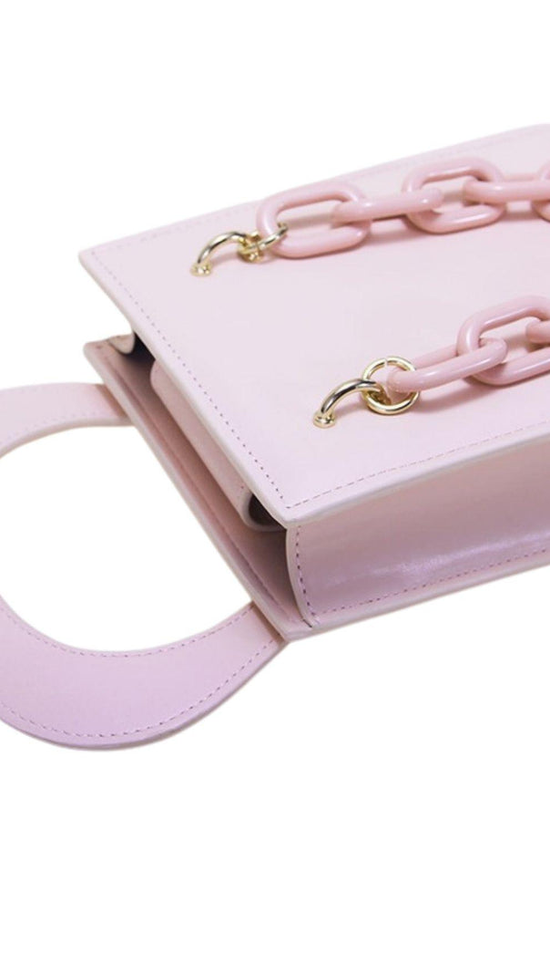 Pfirsichherz-Handtasche.