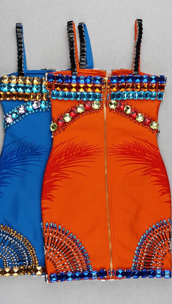 ABITO CON BENDAGGI E DECORAZIONI IN ARANCIONE