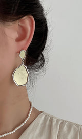 Mirror exaggerated earrings.