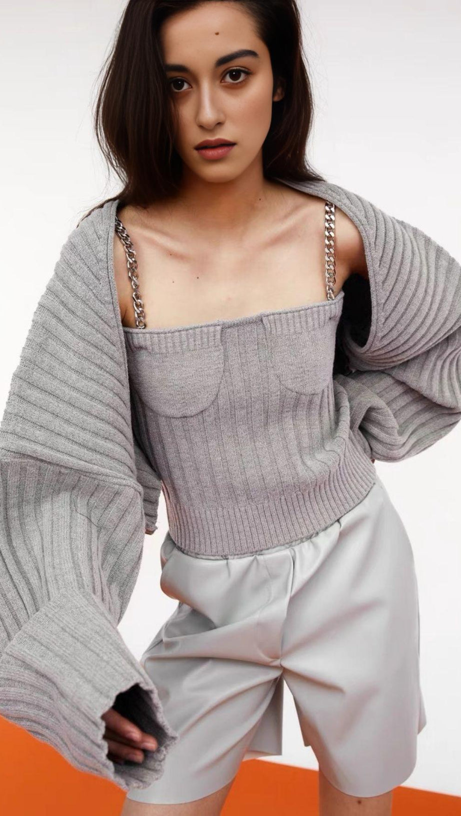 LONG SLEEVE CAMISOLE WITH METAL CHAIN.