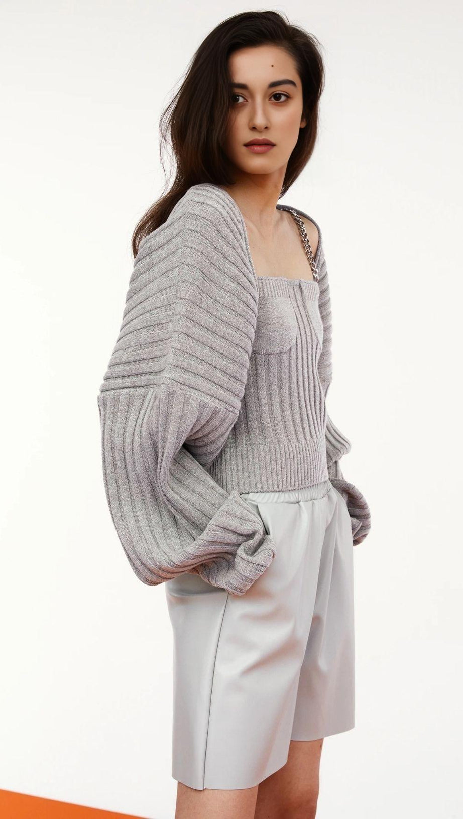 LONG SLEEVE CAMISOLE WITH METAL CHAIN.