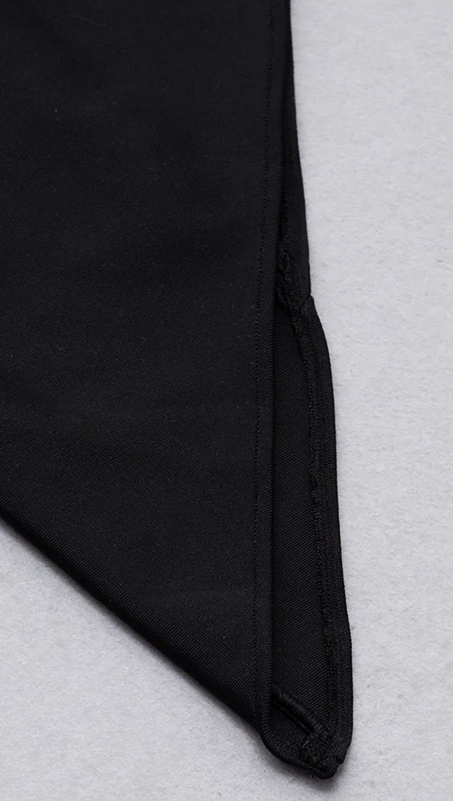 ABITO MIDI ASIMMETRICO IN RETE NERO