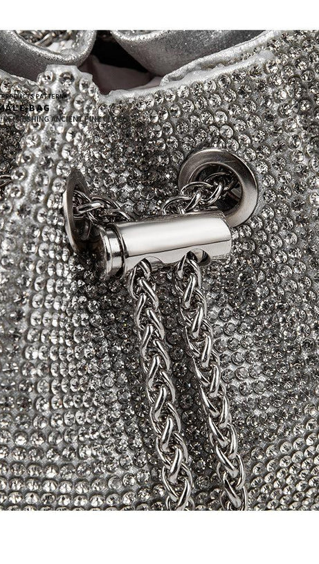 CRYSTAL EMBELLISHED BUCKET BAG IN SILVER