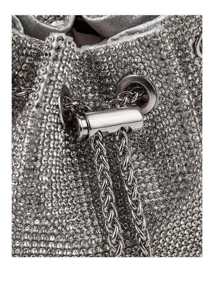 CRYSTAL EMBELLISHED BUCKET BAG IN SILVER