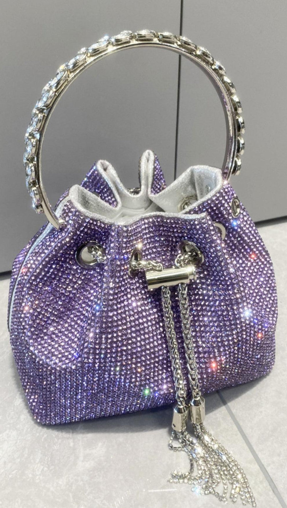 CRYSTAL EMBELLISHED BUCKET BAG IN PURPLE