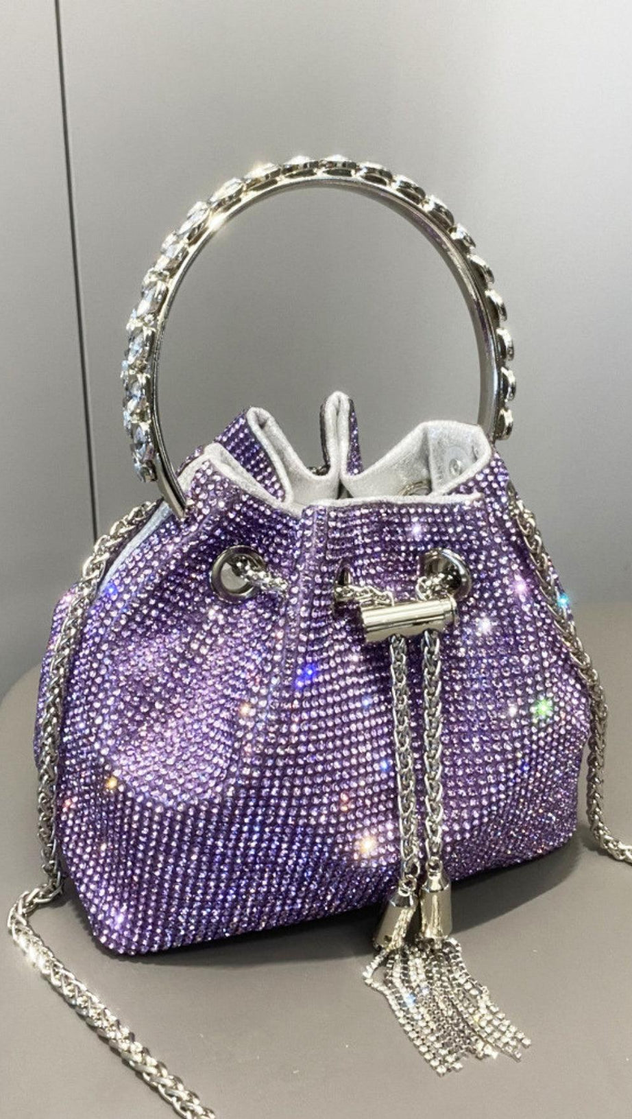 CRYSTAL EMBELLISHED BUCKET BAG IN PURPLE