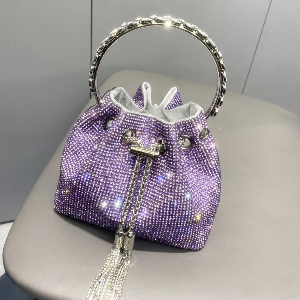 AIIZIE CRYSTAL EMBELLISHED BUCKET BAG IN PURPLE - product image