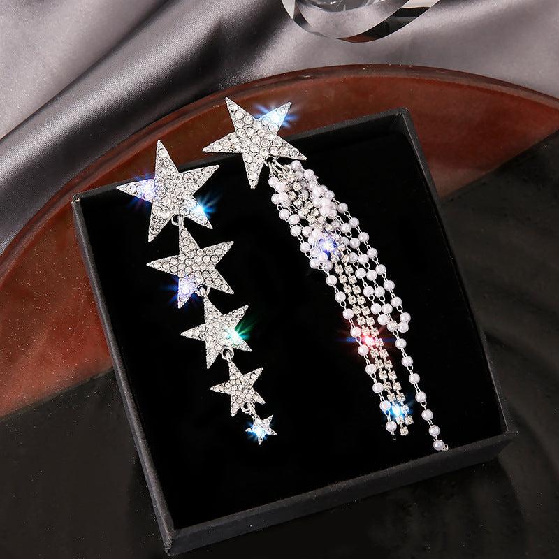 ASYMMETRISCHE STERNOHRRINGE