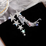 ASYMMETRICAL STAR EARRINGS