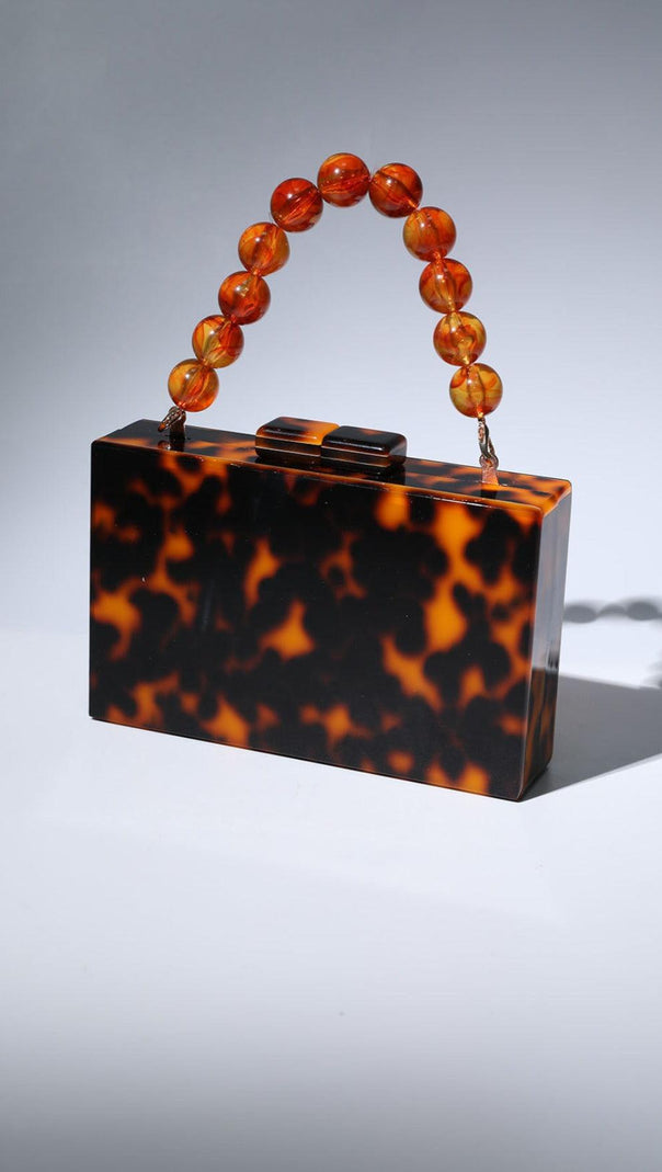 AIIZIE ACRYLIC BEADED CLUTCH IN AMBER - product image
